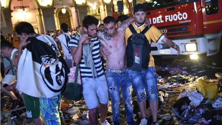[VIDEO] Estampida de hinchas de Juventus provoca cientos de heridos en Turín