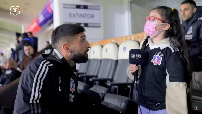 "Sos un amor, como yo": el tierno momento de Emiliano Amor con pequeña hincha de Colo Colo