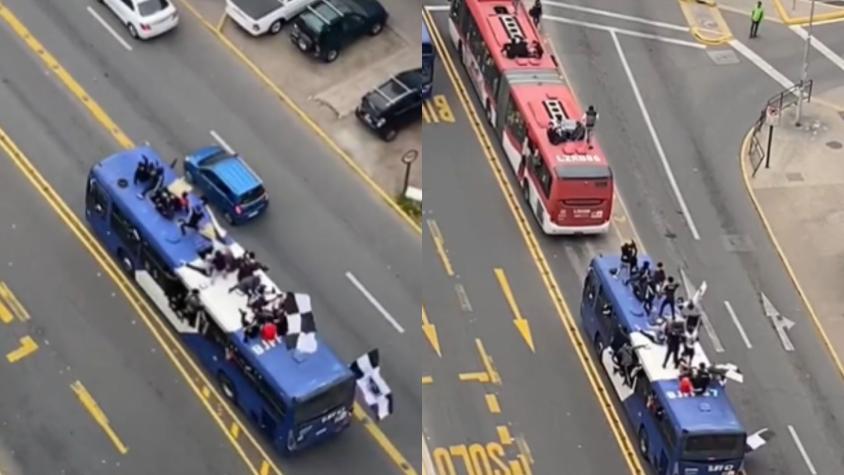 Hinchas de Colo Colo protagonizan una peligrosa maniobra sobre dos buses en tránsito