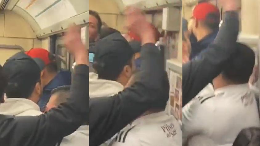 VIDEO | Hincha de la U se fue en el metro rodeado de fanáticos albos y su reacción lo dice todo